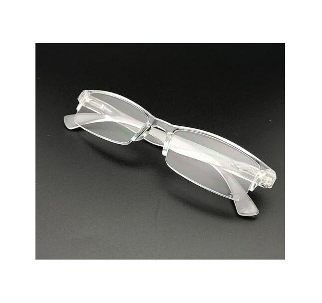 Lentes de lectura, con aumento, diseño medio marco trasparente.