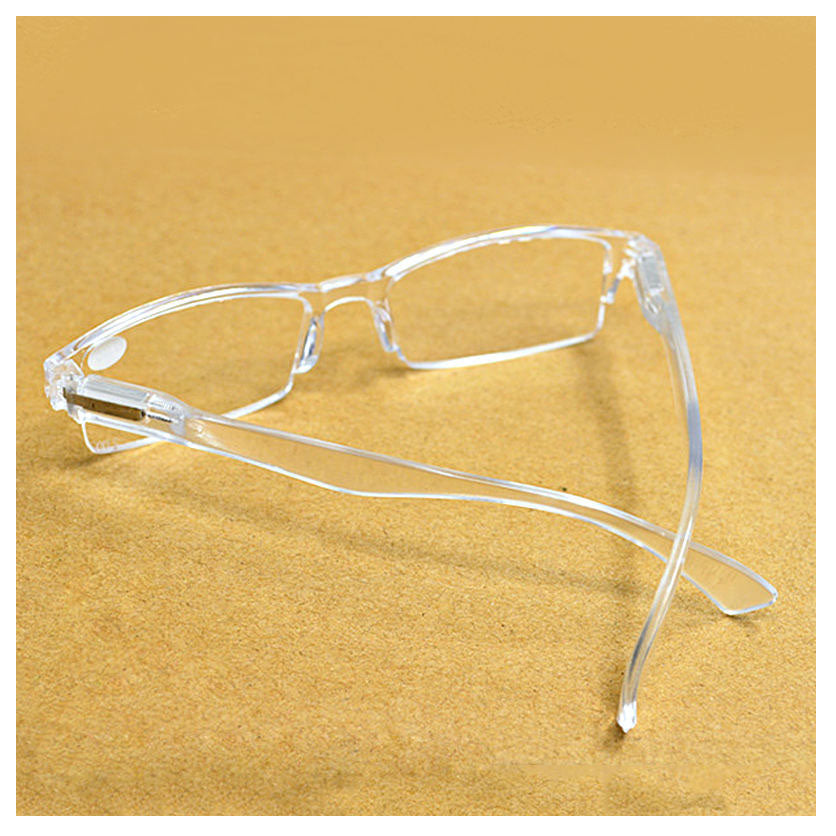 Lentes de lectura, con aumento, diseño medio marco trasparente.
